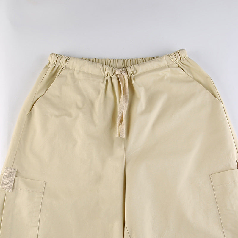 Sleek Casual Asymmetrical Pocket Drawstring Closure Woven Pants
