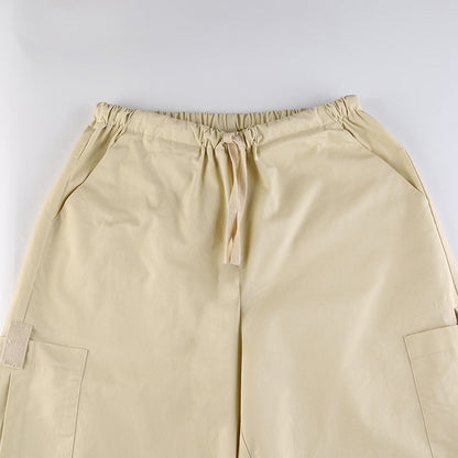 Sleek Casual Asymmetrical Pocket Drawstring Closure Woven Pants