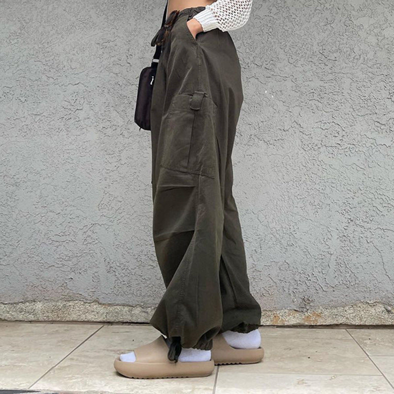 Sleek Casual Asymmetrical Pocket Drawstring Closure Woven Pants